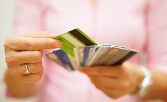 woman choose one credit card from many, concept of credit card debt,