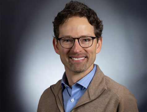 Clearwater coworker, male, posing for headshot