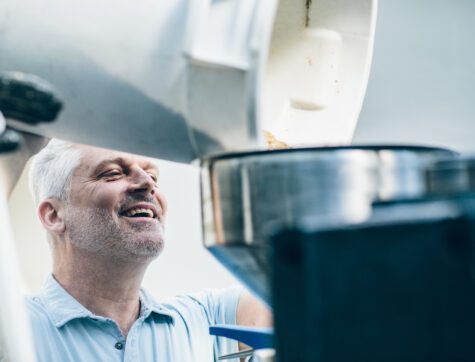 Jack Lawson adding ingredients to Clearwater's branded beer with Imagination Brewing.