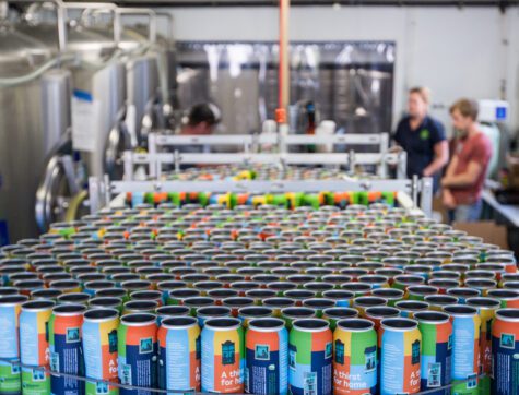 Assembly line of beer cans at Imagine Nation Brewing.