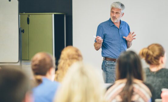 Clearwater staff in a meeting led by CEO Jack Lawson.