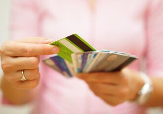 woman choose one credit card from many, concept of credit card debt,