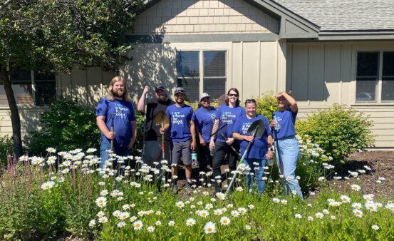 Group of seven Clearwater staff take a group photo while volunteering at the Ronald McDonald House in Missoula, MT.