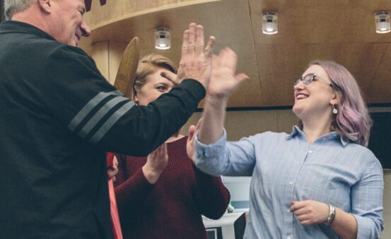 People celebrating the opening of the University of Montana Food Pantry.