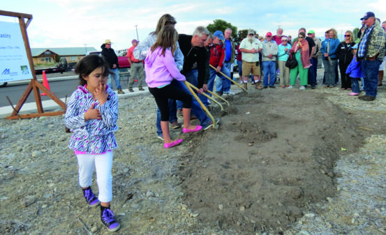 Jack Lawson and community members of the Stevensville community members at a ground breaking for the Twin Creeks subdivision.