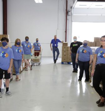 People standing in a food bank - Clearwater Donates $25,000 to Montana Food Bank Network.