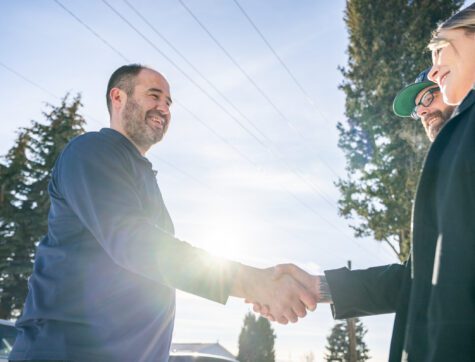 Clearwater employee Tom Boyle, meeting with new homeowners in Butte, Montana.