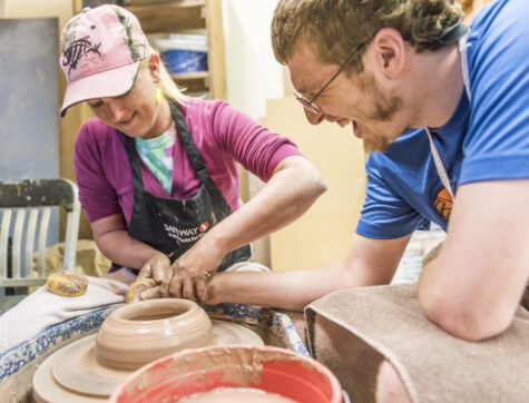 Opportunity Resources Client participating in the assisted pottery program.