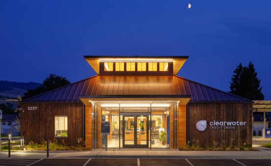 Exterior photo of the Brooks St Branch at night.