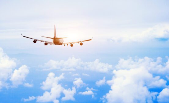 airplane flying in clouds