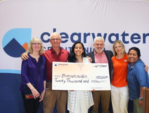 Clearwater CEO and Boardmember presenting donation check at 2025 Annual Member Meeting