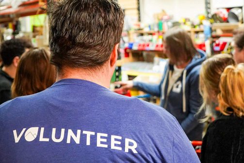 Man wearing a volunteer shirt